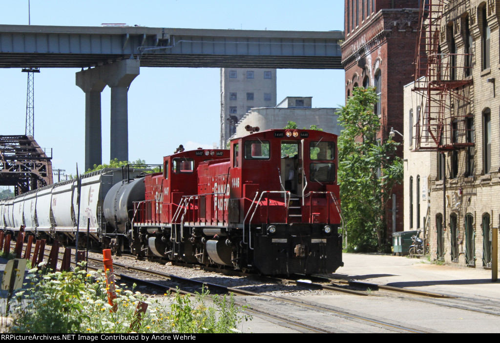 Sequentially numbered MP15s work the Burnham Bridge switch job